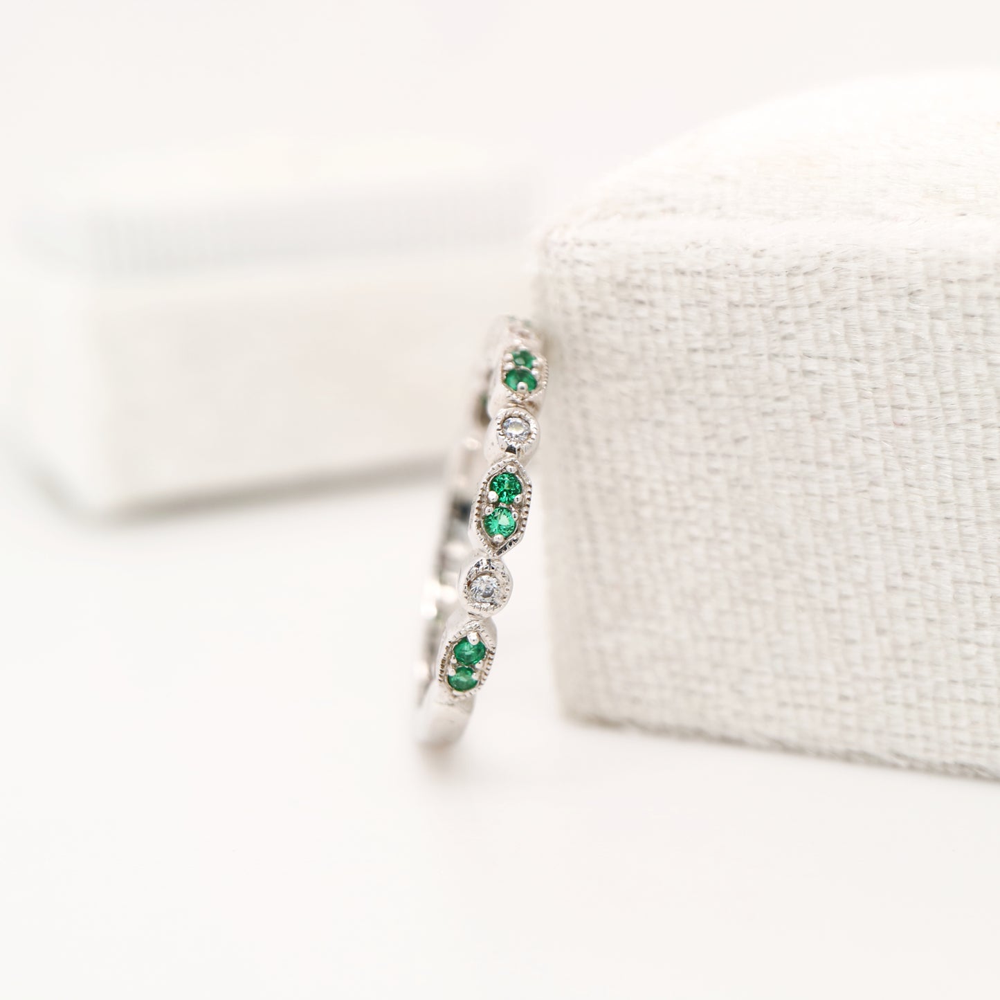 Paired laboratory grown emerald celebration band with cz in sterling silver