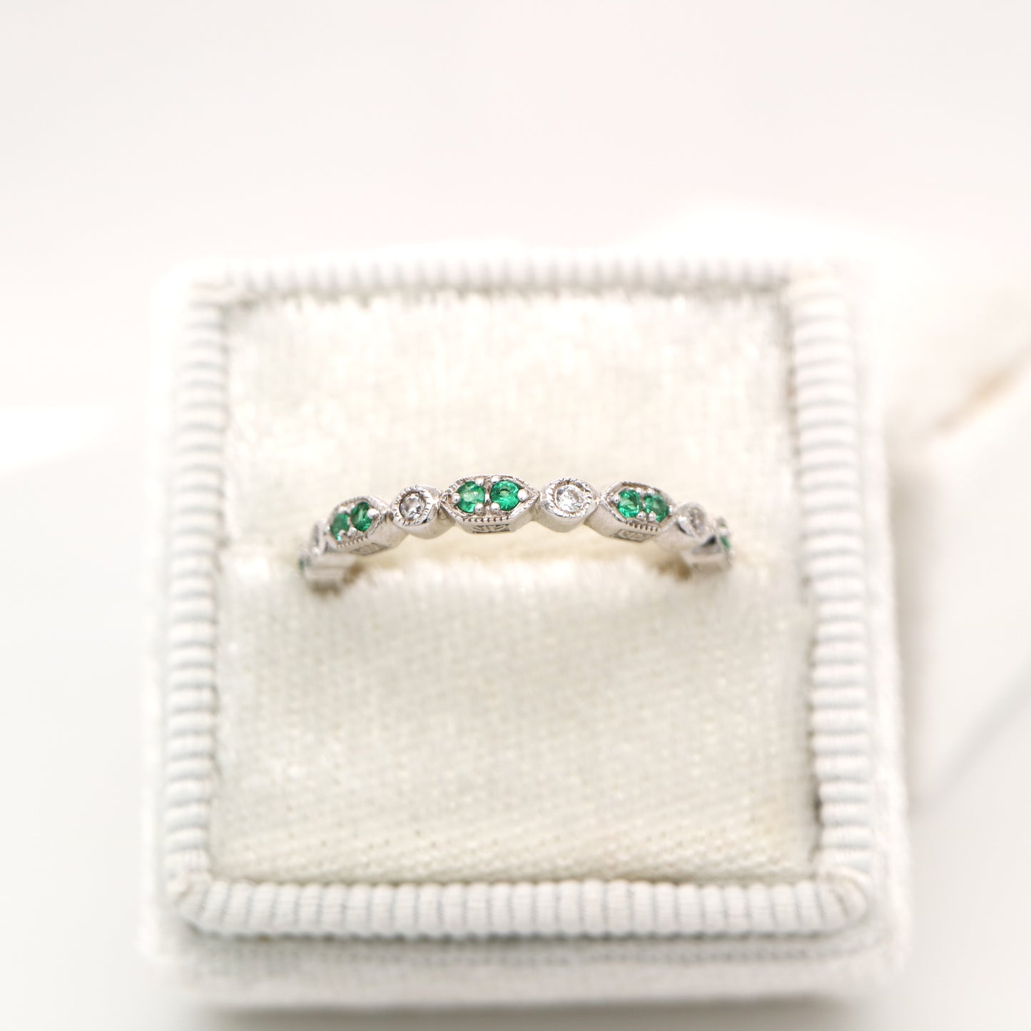 Paired laboratory grown emerald celebration band with cz in sterling silver