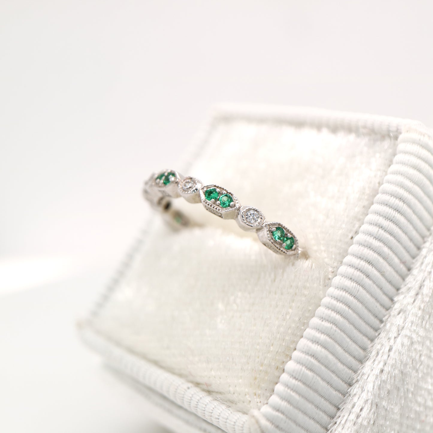 Paired laboratory grown emerald celebration band with cz in sterling silver