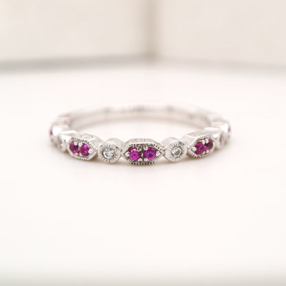 White gold, double ruby and diamond celebration band