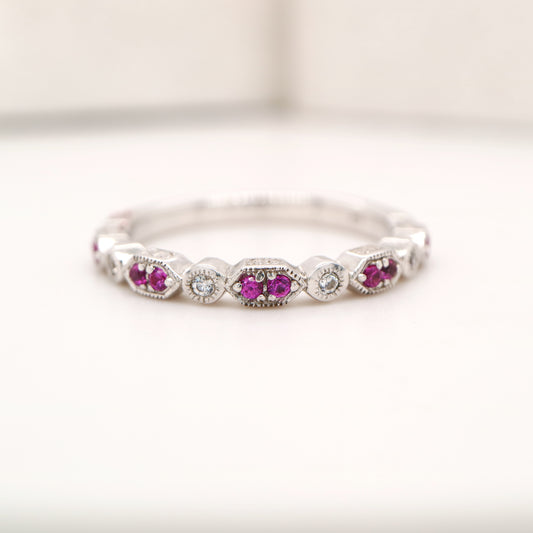 White gold, double ruby and diamond celebration band