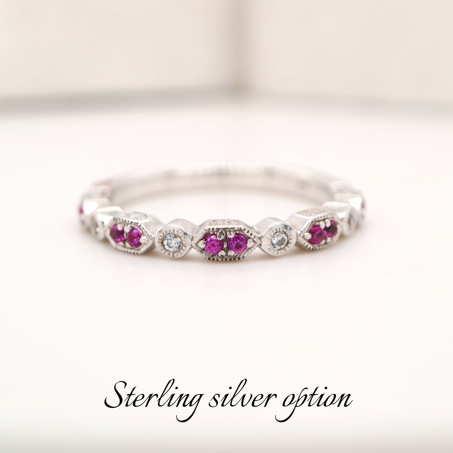 Paired ruby celebration band with cz in sterling silver