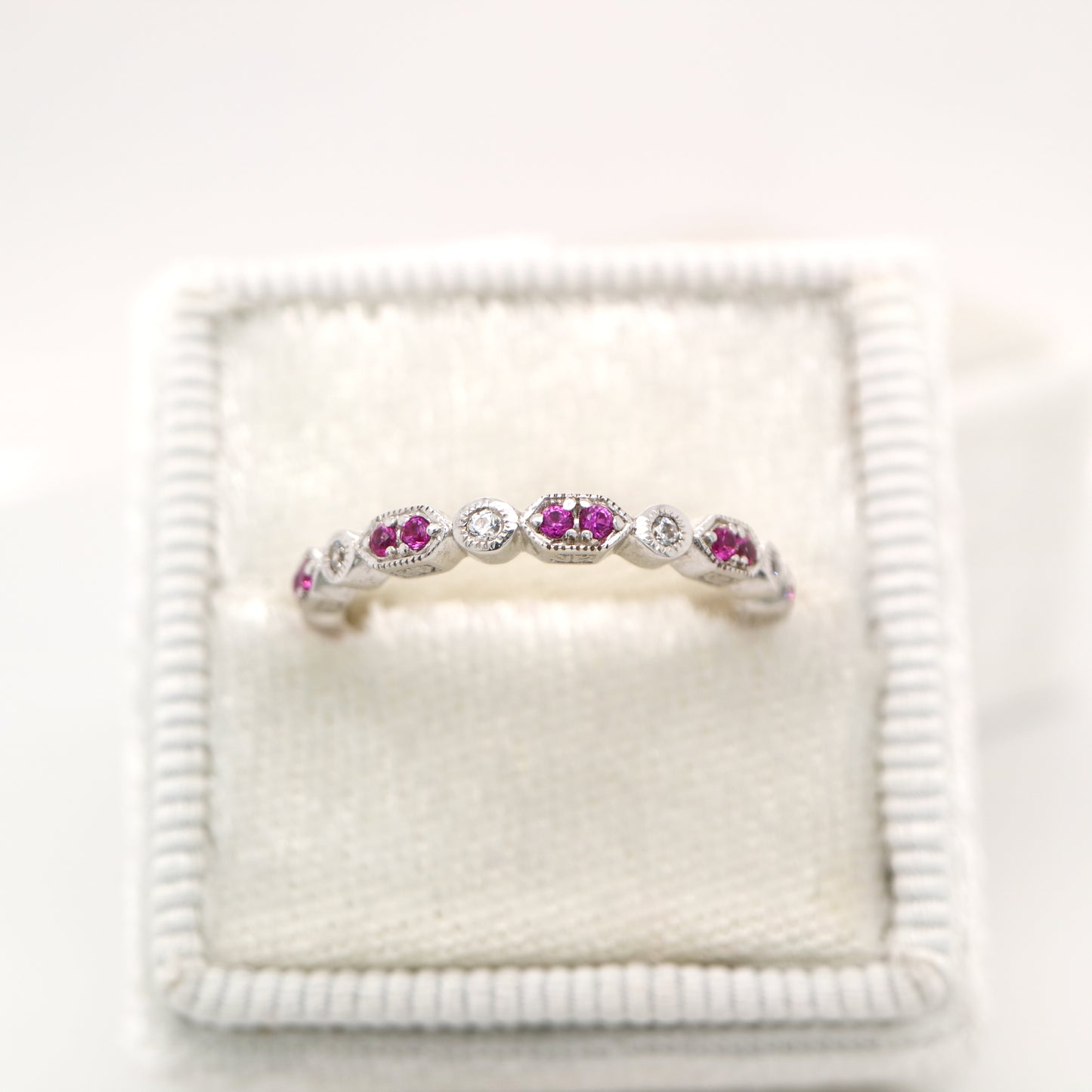 Paired ruby celebration band with cz in sterling silver
