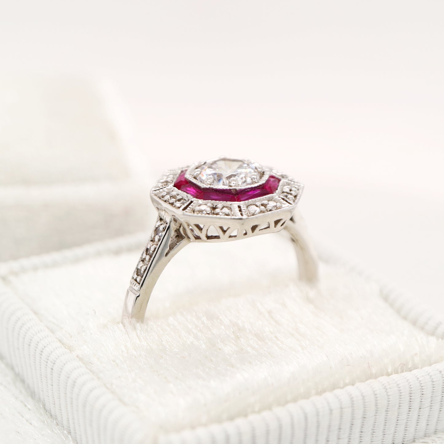 Cz with double halo of laboratory grown ruby and cz in sterling silver