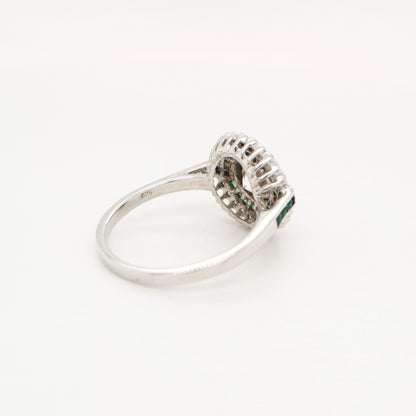 Moissanite and emerald target ring with sapphire accents in white gold