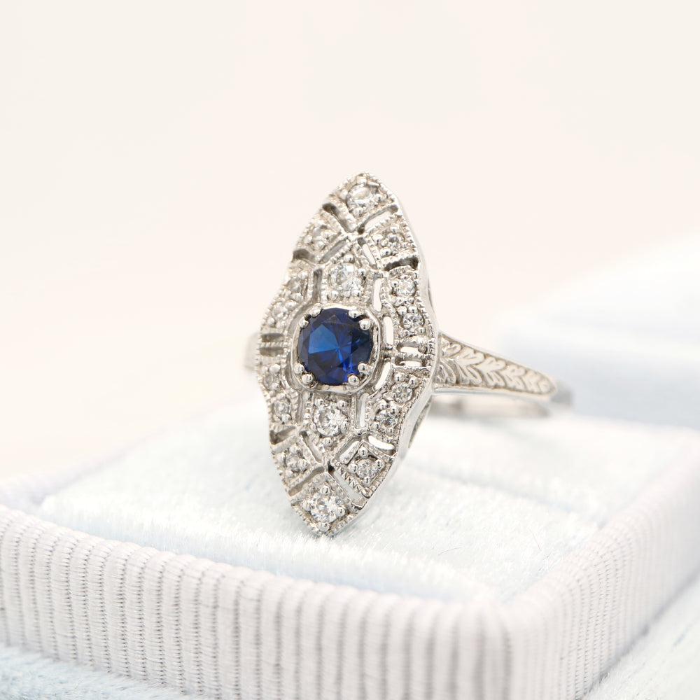 Art deco shield ring with laboratory grown sapphire and cz in sterling silver