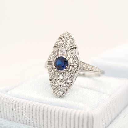 Art deco shield ring with laboratory grown sapphire and cz in sterling silver