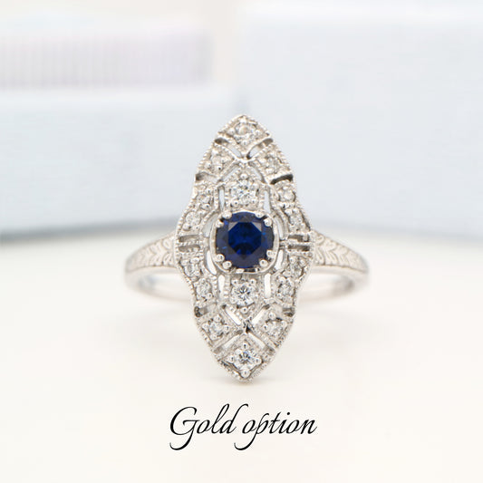 Art deco shield ring in white gold with sapphire and diamond