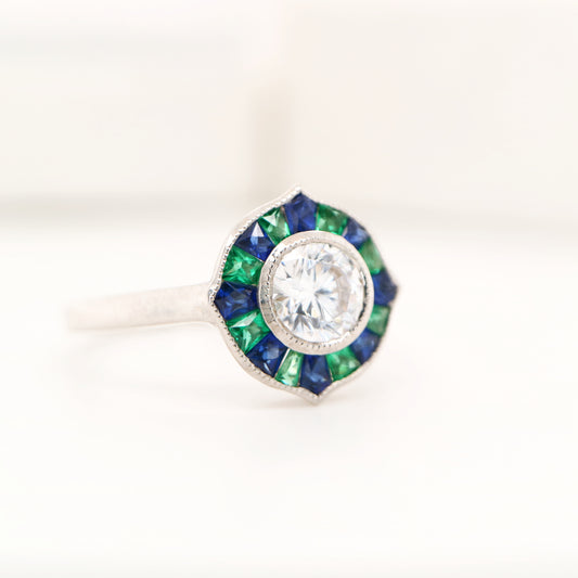 Diamond, emerald and sapphire target ring in white gold