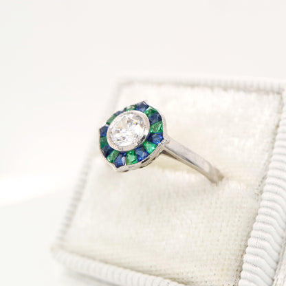 Diamond, emerald and sapphire target ring in white gold