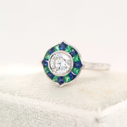 Diamond, emerald and sapphire target ring in white gold
