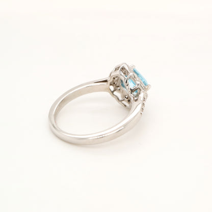 Aquamarine in 9k white gold with diamond halo