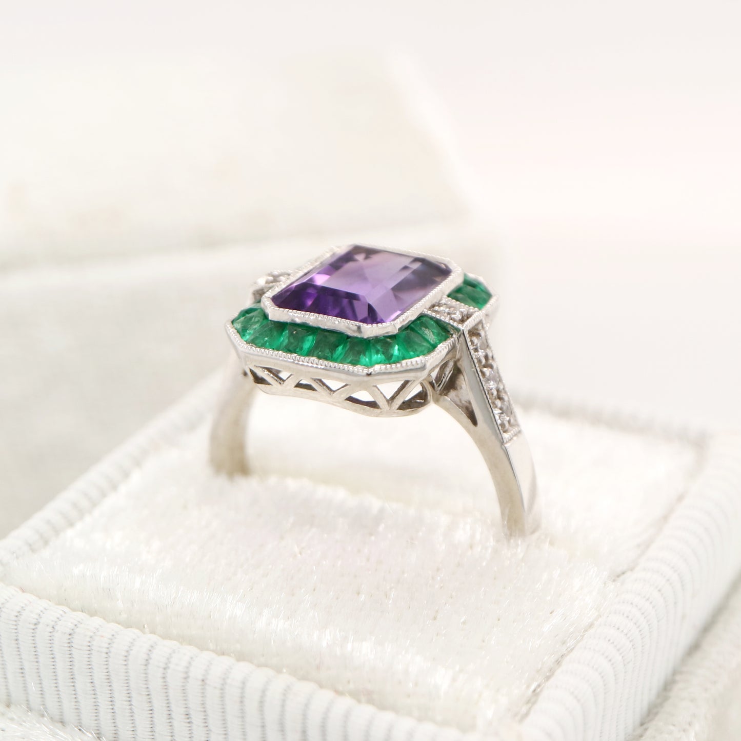 Amethyst and emerald cocktail ring in white gold with diamonds