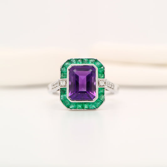 Amethyst and emerald cocktail ring in white gold with diamonds