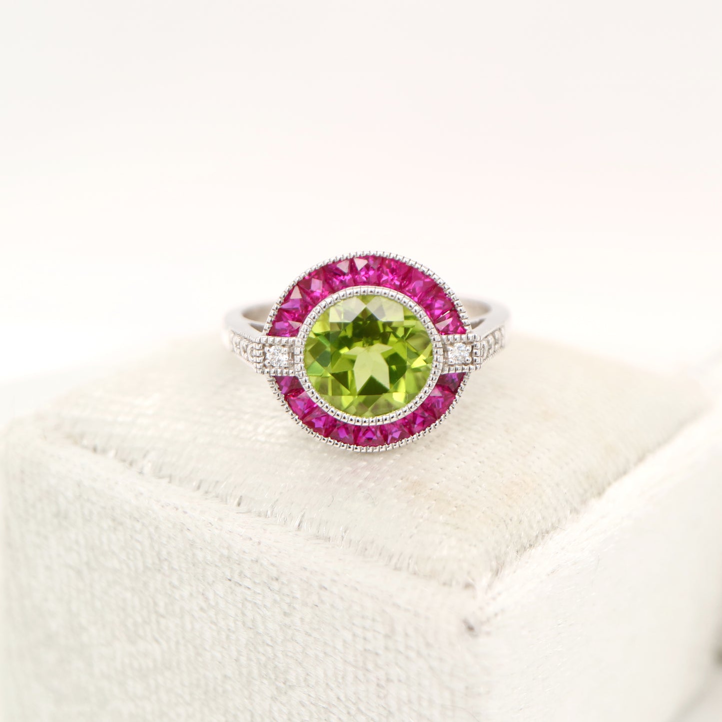 Peridot ruby diamond halo cocktail ring in white gold
