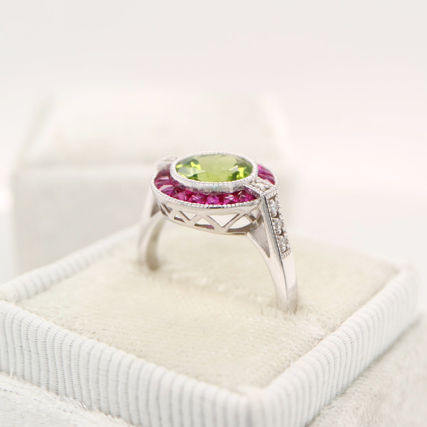 Peridot ruby diamond halo cocktail ring in white gold