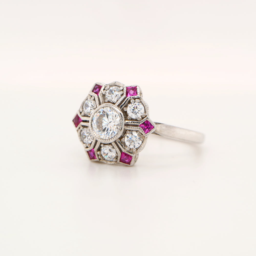Six petal ruby and diamond ring in white gold
