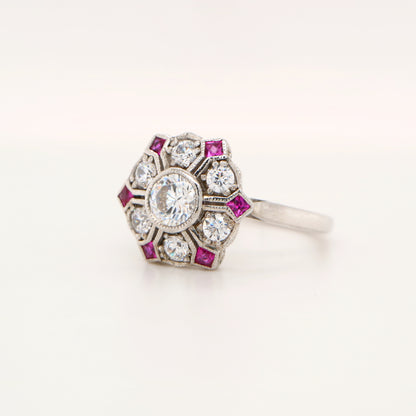 Six petal ruby and diamond ring in white gold