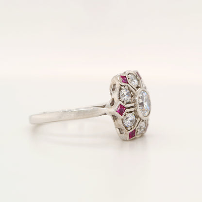 Six petal ruby and diamond ring in white gold