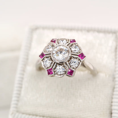 Six petal ruby and diamond ring in white gold