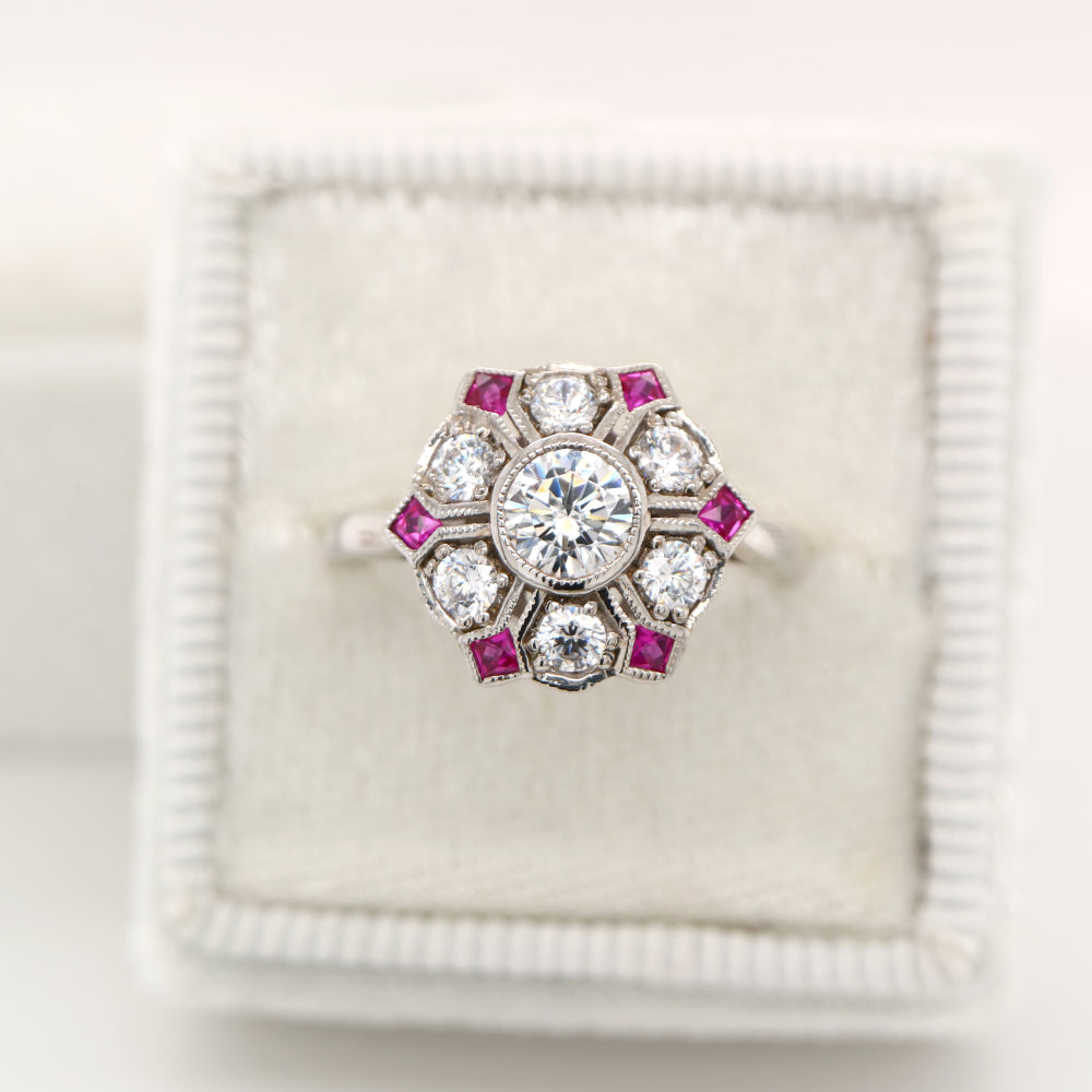 Six petal ruby and diamond ring in white gold