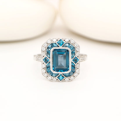 Art deco cocktail ring with london blue topaz and diamond in white gold