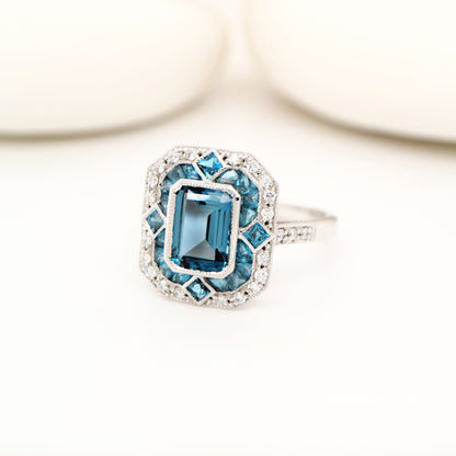Art deco cocktail ring with london blue topaz and diamond in white gold