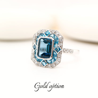 Art deco cocktail ring with london blue topaz and diamond in white gold