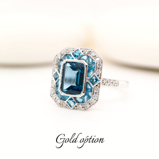 Art deco cocktail ring with london blue topaz and diamond in white gold