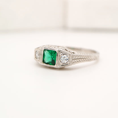 Art deco 9k white gold ring with center emerald and shoulder diamonds