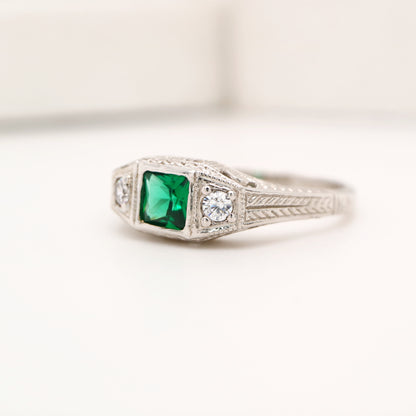 Art deco 9k white gold ring with center emerald and shoulder diamonds