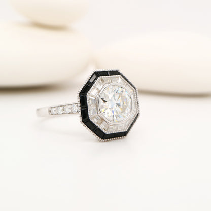 Moissanite target ring with moissanite and onyx halo in white gold