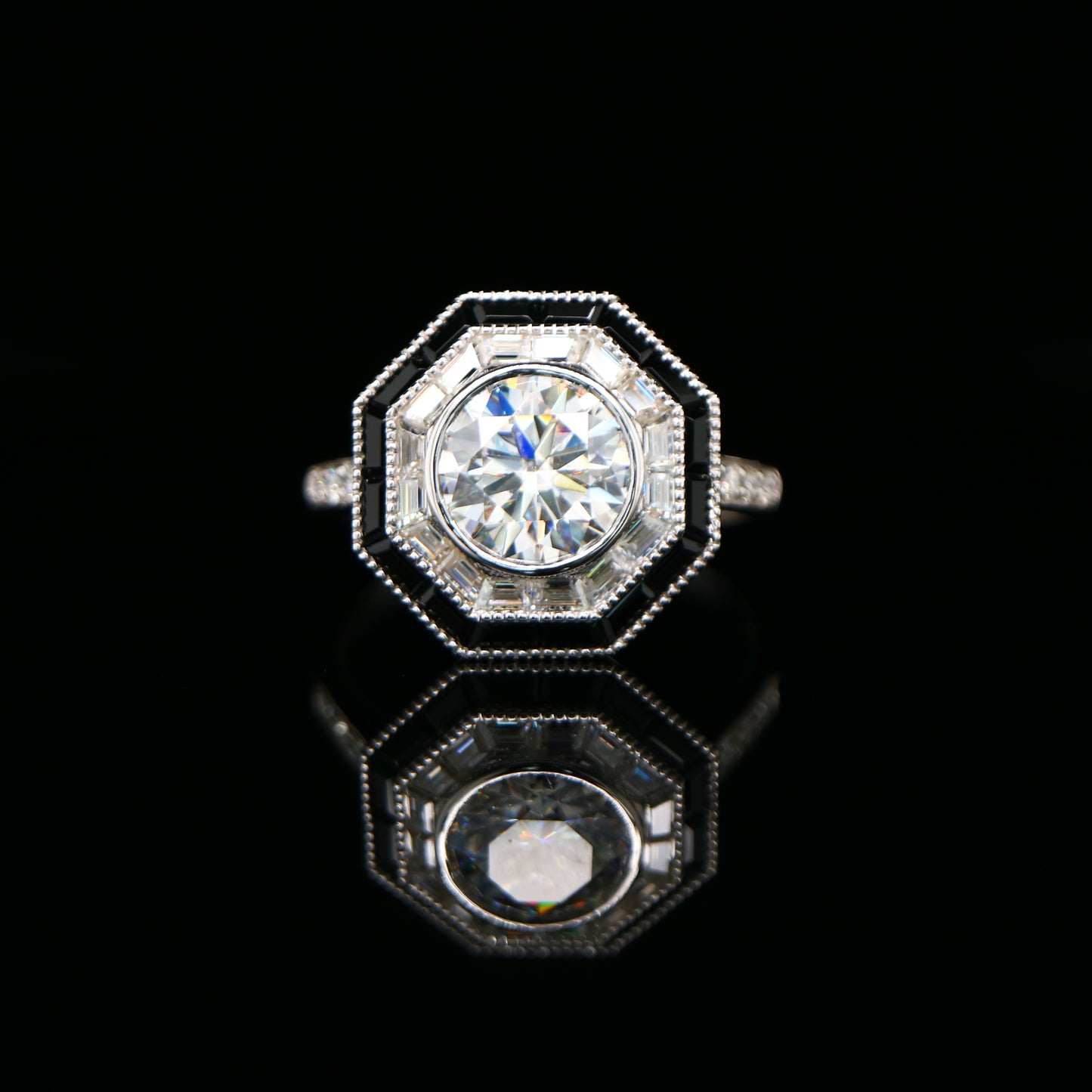 Moissanite target ring with moissanite and onyx halo in white gold