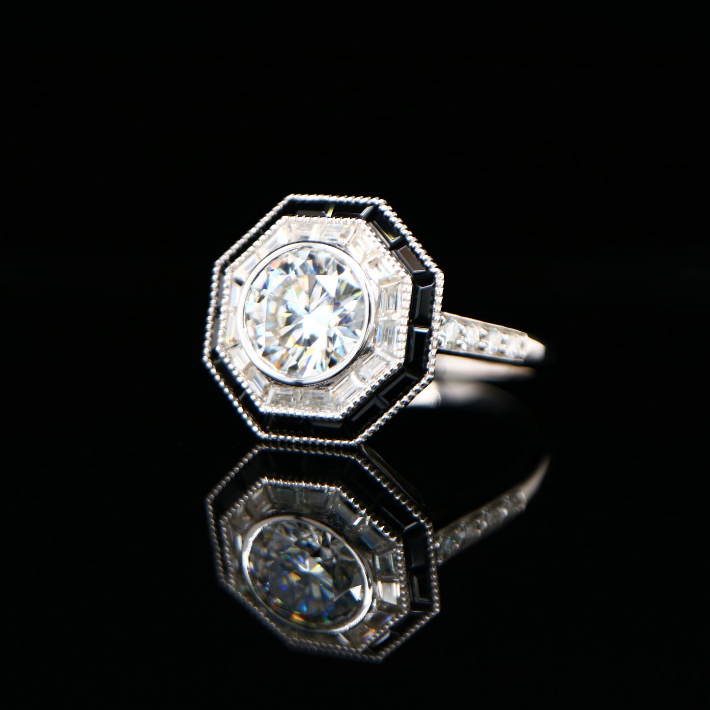 Moissanite target ring with moissanite and onyx halo in white gold