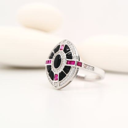 Onyx, ruby and diamond shield target ring in white gold