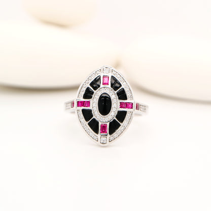Onyx, ruby and diamond shield target ring in white gold