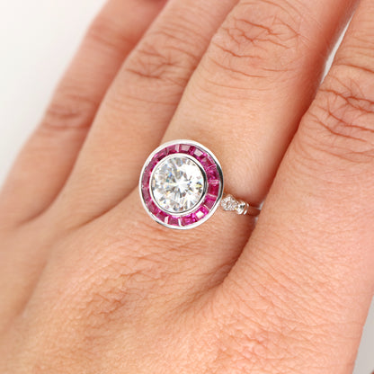 Moissanite with ruby halo ring in white gold