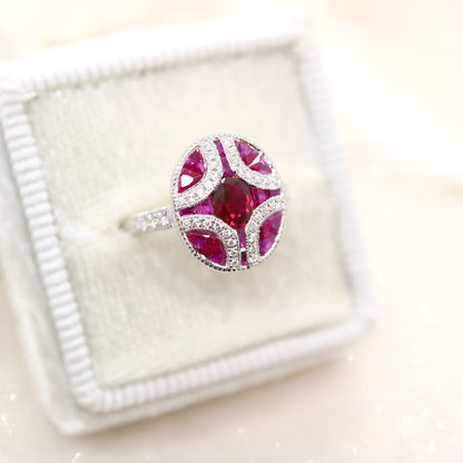 Art deco mystery set ring in white gold, ruby and diamond