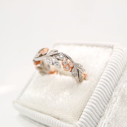 Diamond ring with white gold vine and rose gold berries