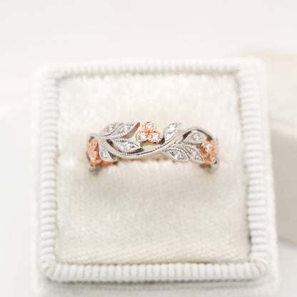 Diamond ring with white gold vine and rose gold berries