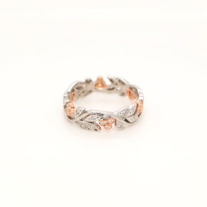 Diamond ring with white gold vine and rose gold berries