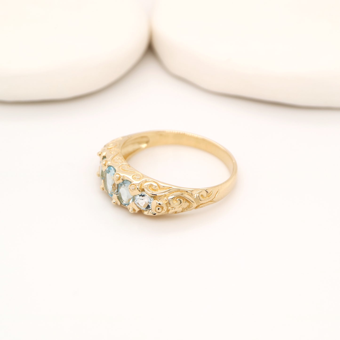 Vintage cascading sky blue topaz ring in yellow gold