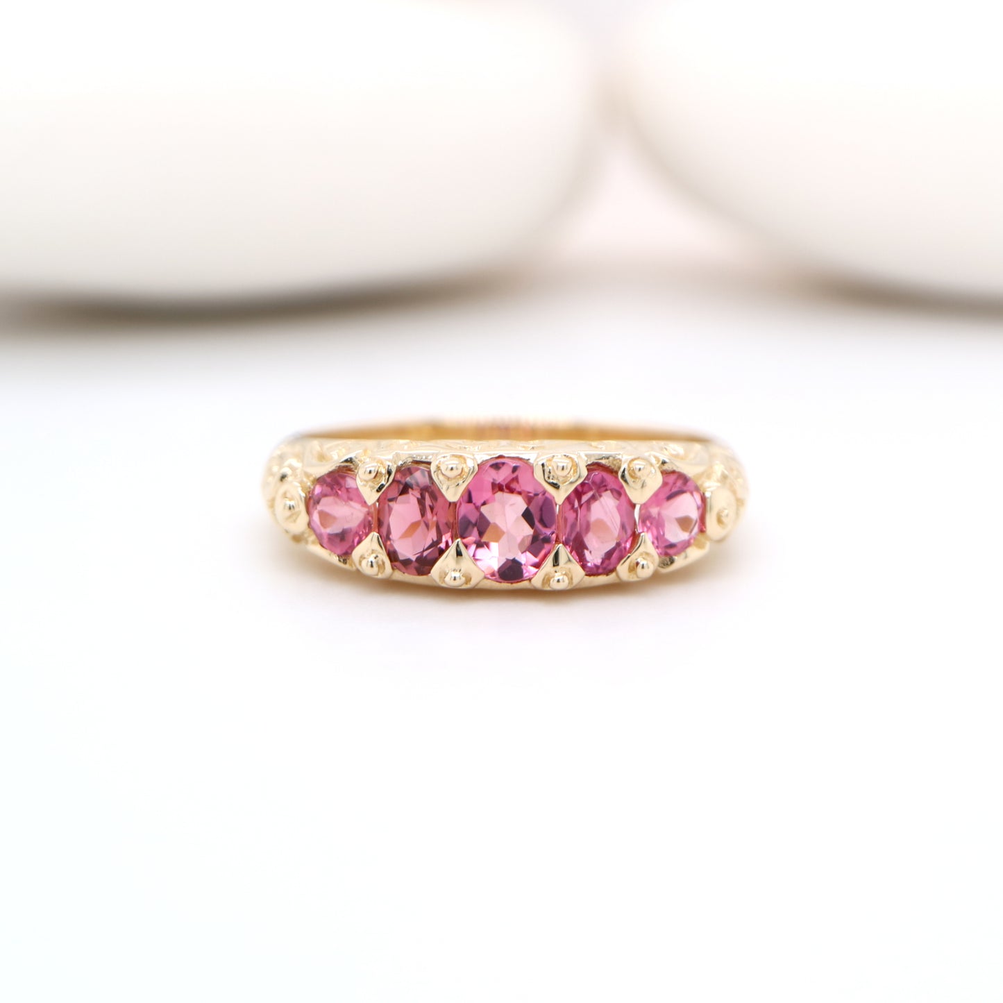 Vintage cascading pink tourmaline ring in yellow gold