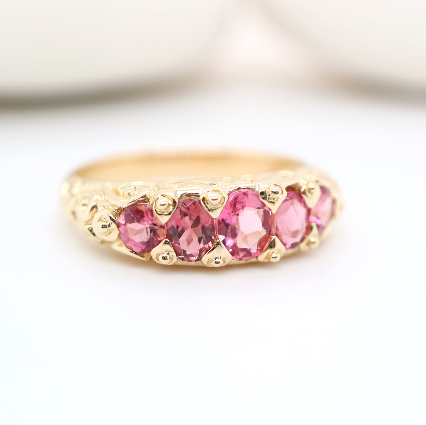 Vintage cascading pink tourmaline ring in yellow gold