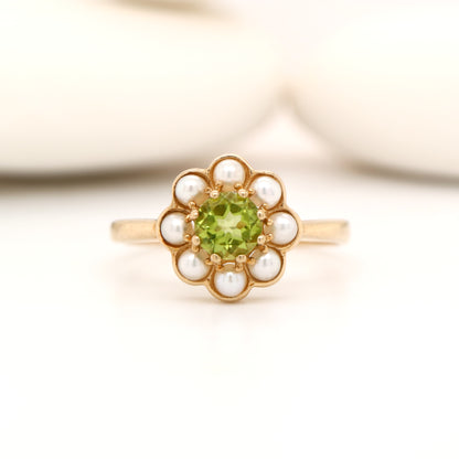 Peridot with pearl halo ring in 9k yellow gold