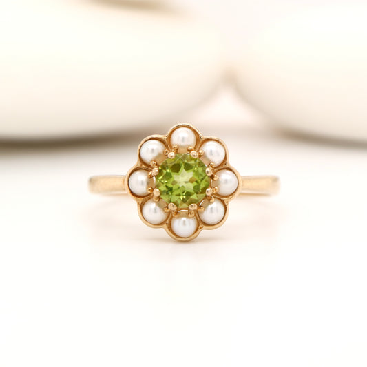 Peridot with pearl halo ring in 9k yellow gold