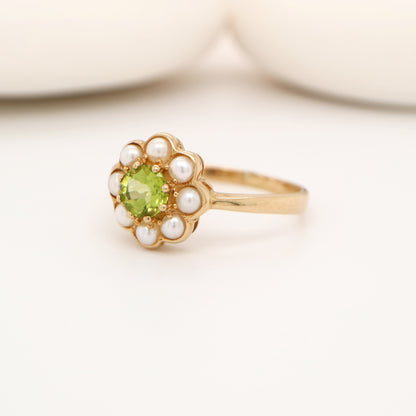 Peridot with pearl halo ring in 9k yellow gold