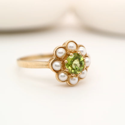 Peridot with pearl halo ring in 9k yellow gold