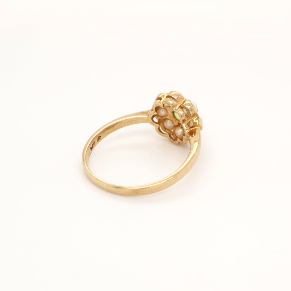 Peridot with pearl halo ring in 9k yellow gold
