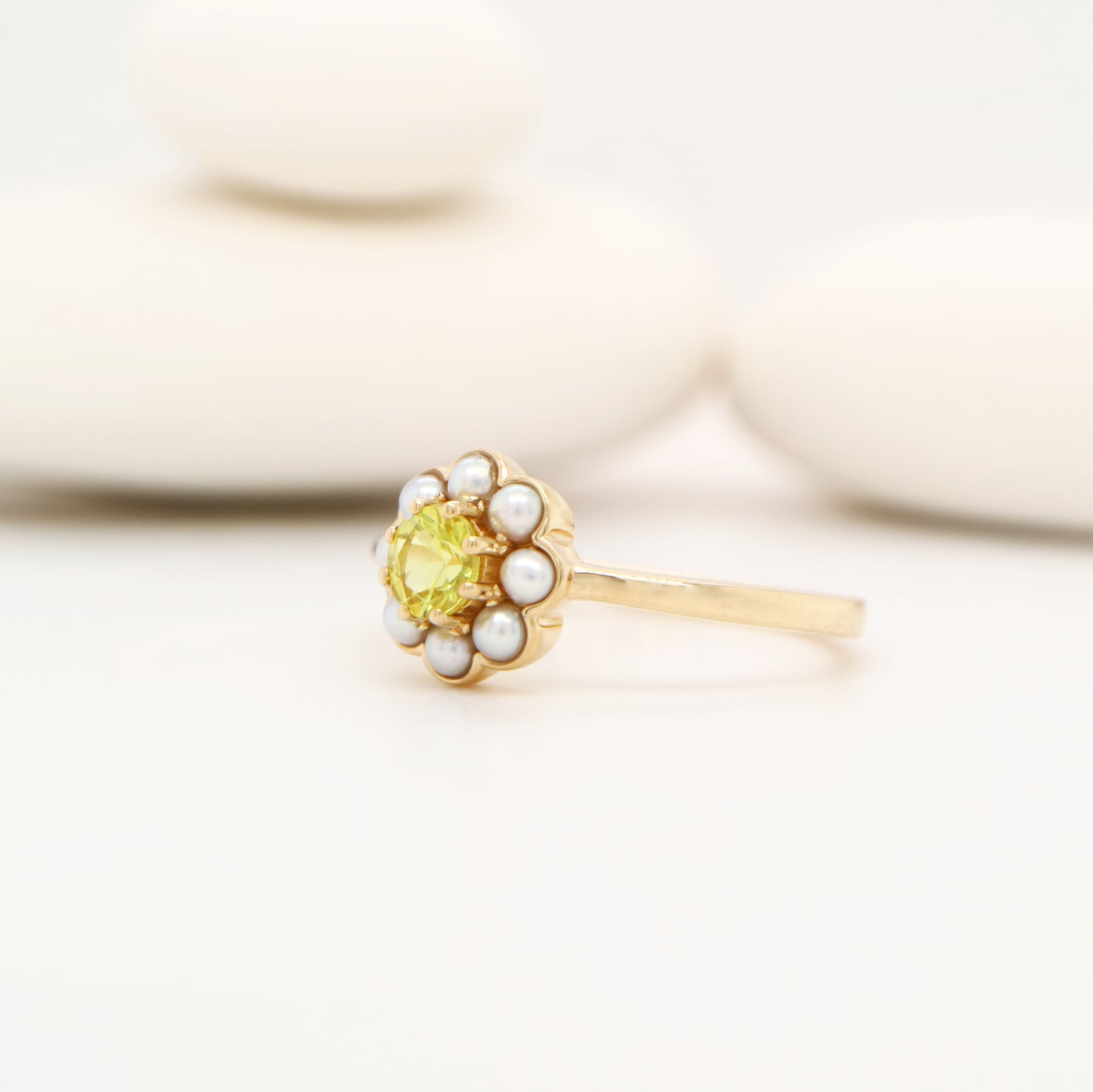 Yellow sapphire with pearl halo ring in 9k yellow gold